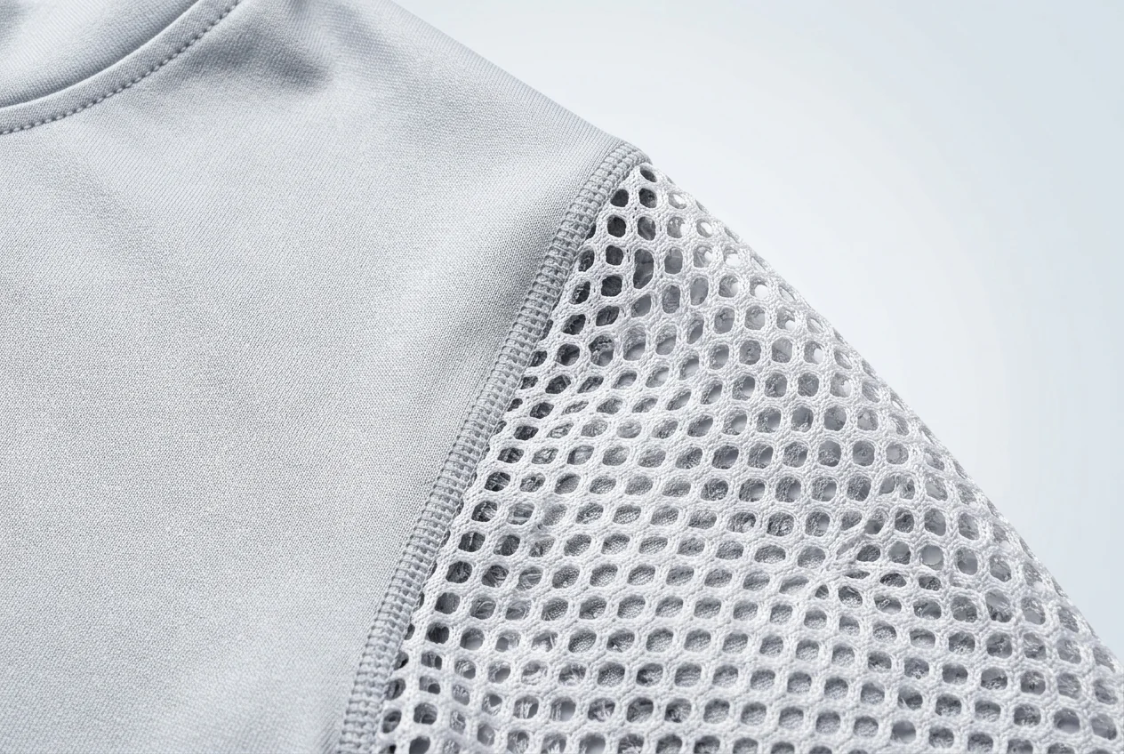 Breathable mesh fabric for cycling jersey vent zones